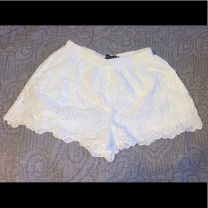 LF Never worn! Embroidered white shorts.